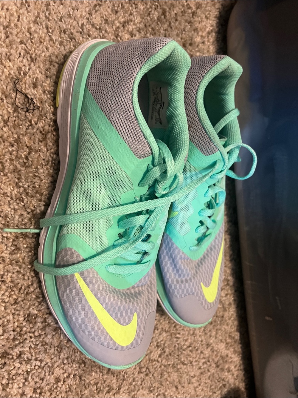 Nike Women's Mint Green & Gray Athletic Sneakers with Yellow Swoosh